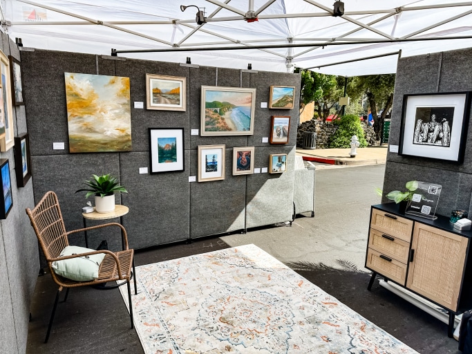 Original artwork displayed in Jill Weeks Smith's booth at an outdoor art show
